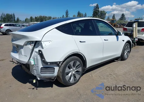 2023 Tesla Model Y Awd/Long Range Dual Motor All-Wheel Drive z USA, uszkodzony, nr VIN 7SAYGAEE1PF700262